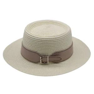 Flat top straw hat detail view showing the elegant pink leather belt and metal buckle design.