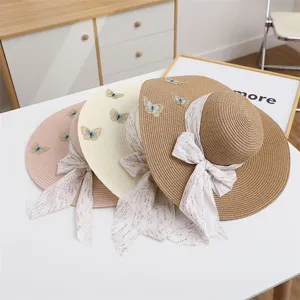 Women's summer straw sun hat with ribbon and butterfly embroidery for beach vacation outdoor.