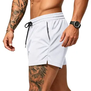 Detailed view of white athletic mesh shorts with drawstring and pocket for men summer gym fitness.