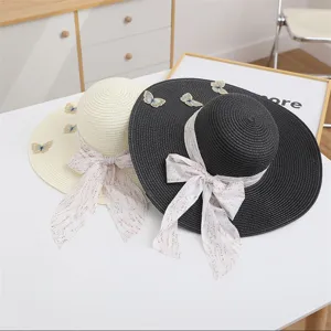 Women summer wide brim straw hat with floral ribbon bow and butterfly embroidery beach cap.