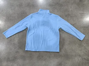 Back view of light blue fleece half-zip sweatshirt showing fabric texture and cozy collar.