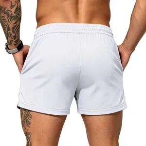 Rear view detail of men's white athletic shorts with breathable mesh and elastic waistband.