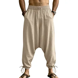 Men's casual linen harem pants with elastic drawstring waist, side pockets, and cuffed ankles.
