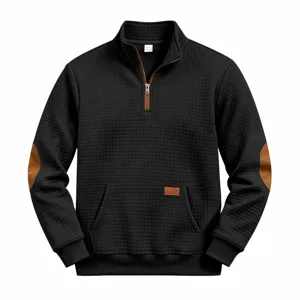 Detail view of black quarter-zip sweatshirt with brown suede elbow patches and collar.