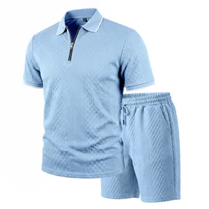 Detailed view of the light blue men jacquard texture polo shirt and matching shorts set.