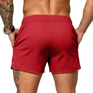 Detailed back view of men's red athletic sports shorts with breathable mesh fabric.