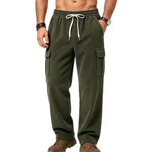 Men's green corduroy cargo pants detail featuring drawstring waist and deep side pockets.