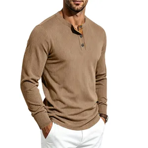 Detail view of men's vintage ribbed long sleeve Henley shirt with contrast placket top.