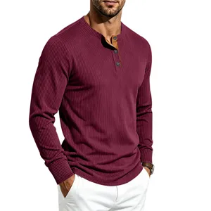 Men's retro long sleeve contrast Henley shirt with ribbed knit fabric and button collar detail.