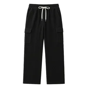 Black corduroy cargo pants detail showing elastic drawstring waist and side utility pockets.