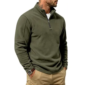 Detail view of men's army green half-zip fleece sweatshirt, featuring a stand collar and cozy fabric.