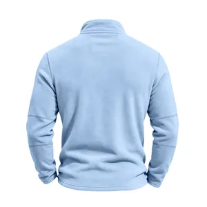 Back detail of a light blue fleece half-zip jacket, showing cozy texture and stand collar.