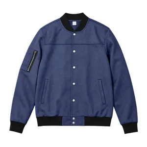 Detail shot of blue suede bomber jacket with black ribbed collar and metal snap buttons.