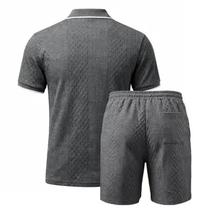Men gray knit polo shirt and shorts set back detail showing texture and back pocket design.