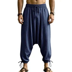 Men's loose linen harem pants casual drop crotch baggy trousers with drawstring waist and cuffs.