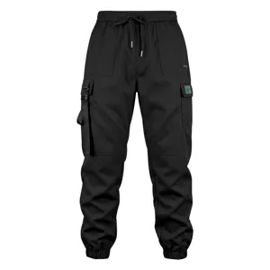 Men's black cargo pants with multi-pockets, elastic drawstring waist, and stylish jogger cuffs.