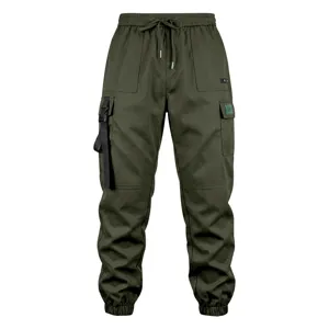 Green mens cargo pants detail featuring elastic drawstring waist and multi pocket design.