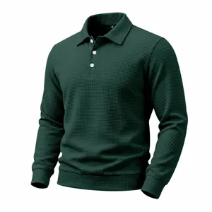 Dark green waffle knit long sleeve polo shirt detail, textured fabric and button placket.