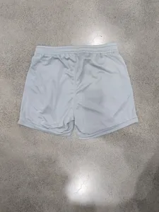 Quick-dry mesh sports shorts detail, elastic waist design, breathable casual five-point pants.