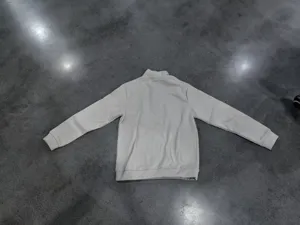 Solid color fleece lined stand collar half zip sweatshirt back view showing casual style.