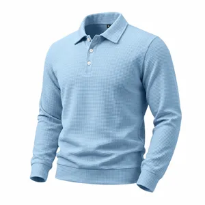 Light blue waffle knit long sleeve polo shirt detail, casual mens clothing texture.