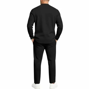 Men long sleeve henley shirt and straight pants set black casual apparel detail view.
