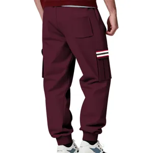 Back view detail of mens fleece cargo sweatpants featuring side pockets and striped webbing.