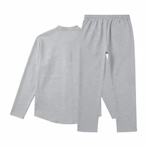 Grey long sleeve henley shirt and straight trousers set, casual vintage style detail view.