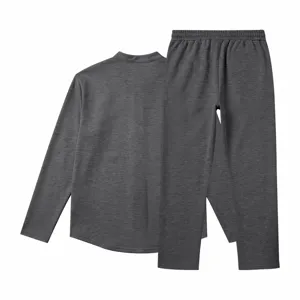 Dark grey long sleeve top and straight trousers set detail view showing fabric texture.