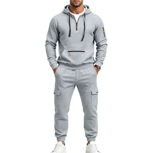 Grey hoodie cargo pants set detail view, featuring zipper pockets and adjustable drawstring.