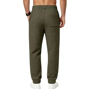 Men's textured casual sweatpants in olive green with relaxed fit and comfortable wear.