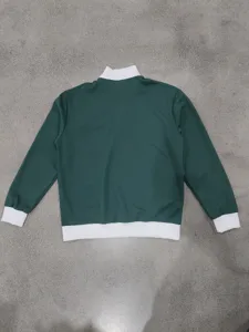 Dark green waffle knit long sleeve sweatshirt back detail, casual daily wear fabric texture.