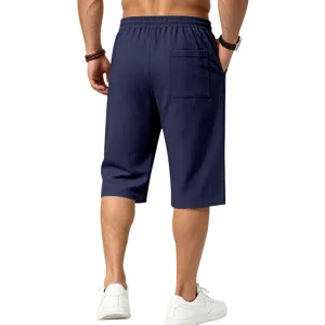 Detailed close-up view showing the dark blue casual shorts back pocket and soft fabric texture.