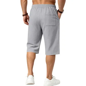 Men's grey casual linen-feel 7-point shorts with elastic waistband and back pocket.