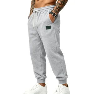 Men's gray fleece lined jogger detail, casual loose fit sweatpants with drawstring waist.