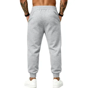 Detailed back view of men's fleece-lined casual grey joggers, featuring ribbed cuffs and pocket.