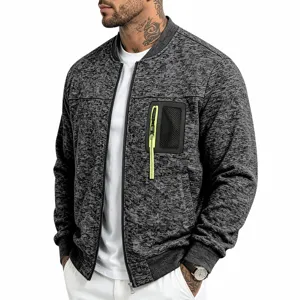 Close-up view of the knit bomber jacket showing contrast neon zipper chest pocket detail.