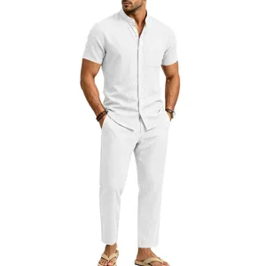 Men's casual white linen short sleeve henley shirt and matching trousers detail view.
