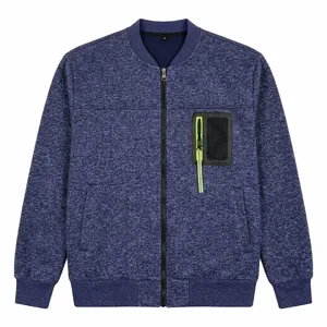 Close-up detail of the blue knit bomber jacket featuring zipper pocket and ribbed collar.