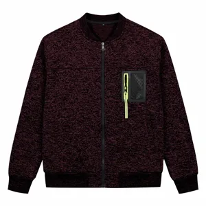 Close-up view of the knitted bomber jacket featuring a neon green zipper pocket and soft fabric.