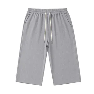 Knit texture casual 3/4 shorts detail view, featuring comfortable elastic drawstring.
