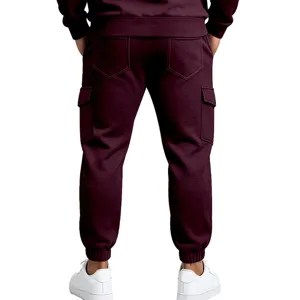 Detail view of men's casual heavy fleece-lined cargo sweatpants with elastic cuffs and back pockets.