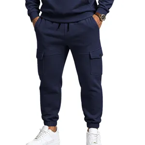 Detailed view of men's heavyweight fleece-lined cargo sweatpants in dark blue with pockets.