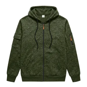 Detailed close-up view of the dark green tactical zip hoodie showcasing sleeve pocket and zipper.