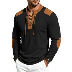 Detailed view of men vintage waffle knit long sleeve henley shirt with contrast patches.