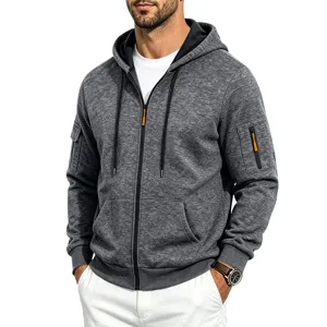 Close-up detail of men's heather grey zip-up hoodie featuring tactical sleeve pockets and orange pulls.