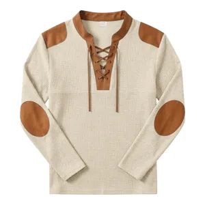 Men's vintage waffle knit long sleeve henley shirt with contrast patches and lace-up front.