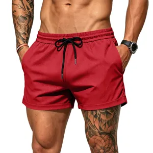Men's red mesh athletic fitness shorts, breathable running beach swimwear shorts detail.