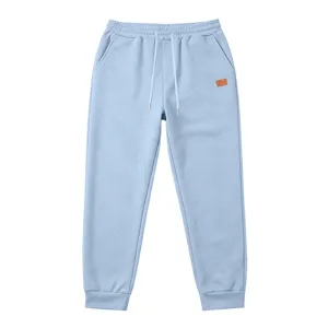 Men's casual textured sweatpants light blue loose fit drawstring sports trousers.