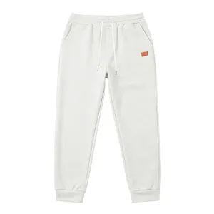 Textured sweatpants detail, close-up of drawstring waist, cozy casual streetwear style.